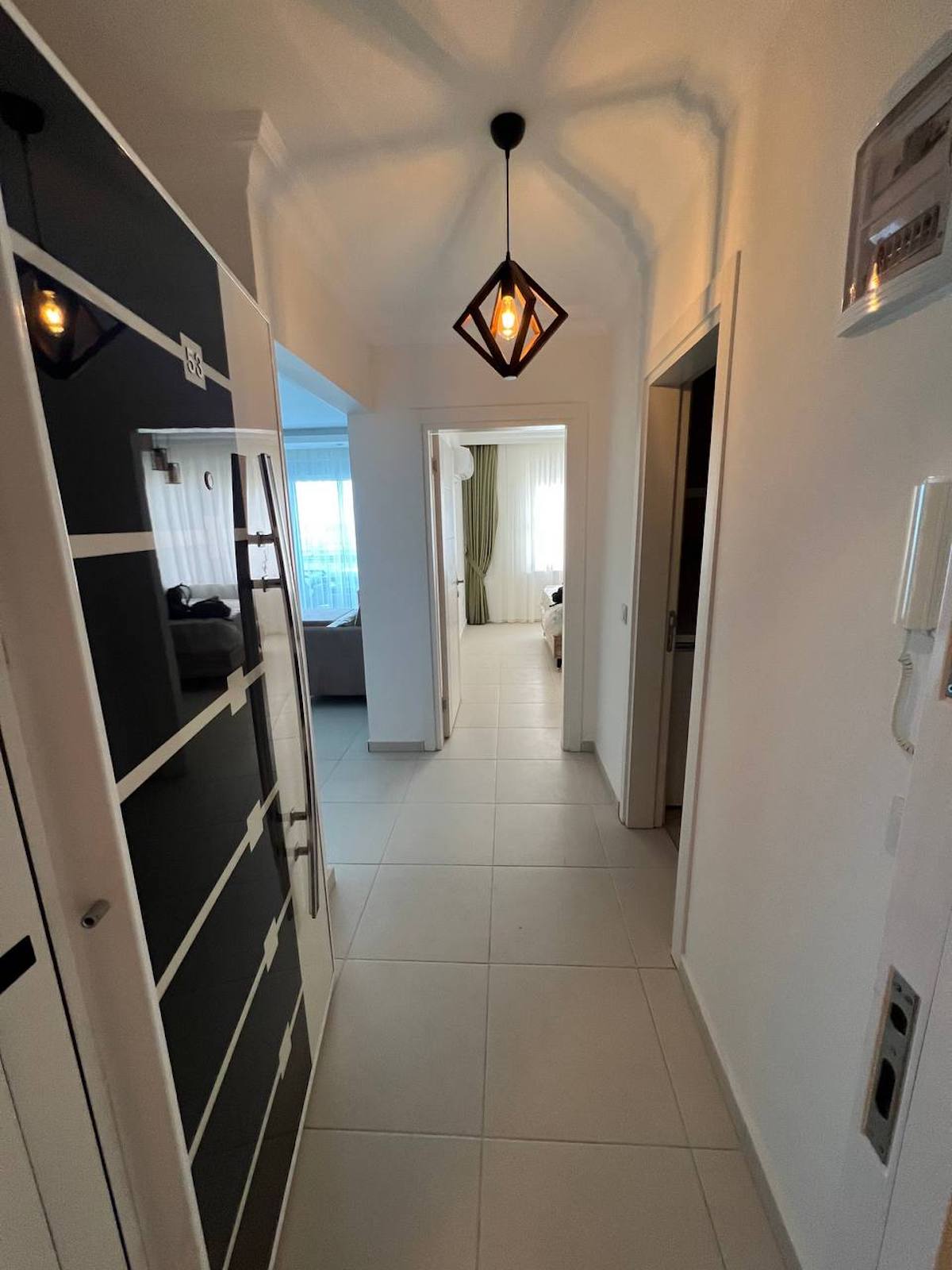 квартира 1+1 с панорамным видом в районе Махмутлар