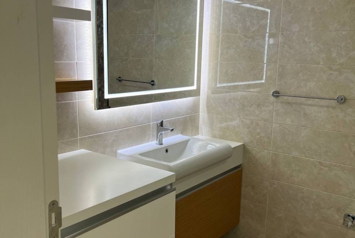 квартира 1+1 с панорамным видом в районе Махмутлар