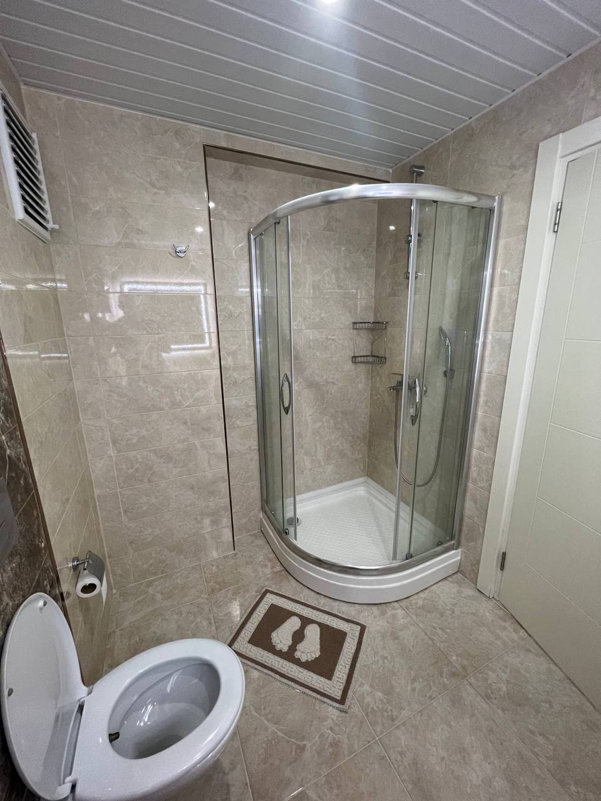 квартира 1+1 с панорамным видом в районе Махмутлар