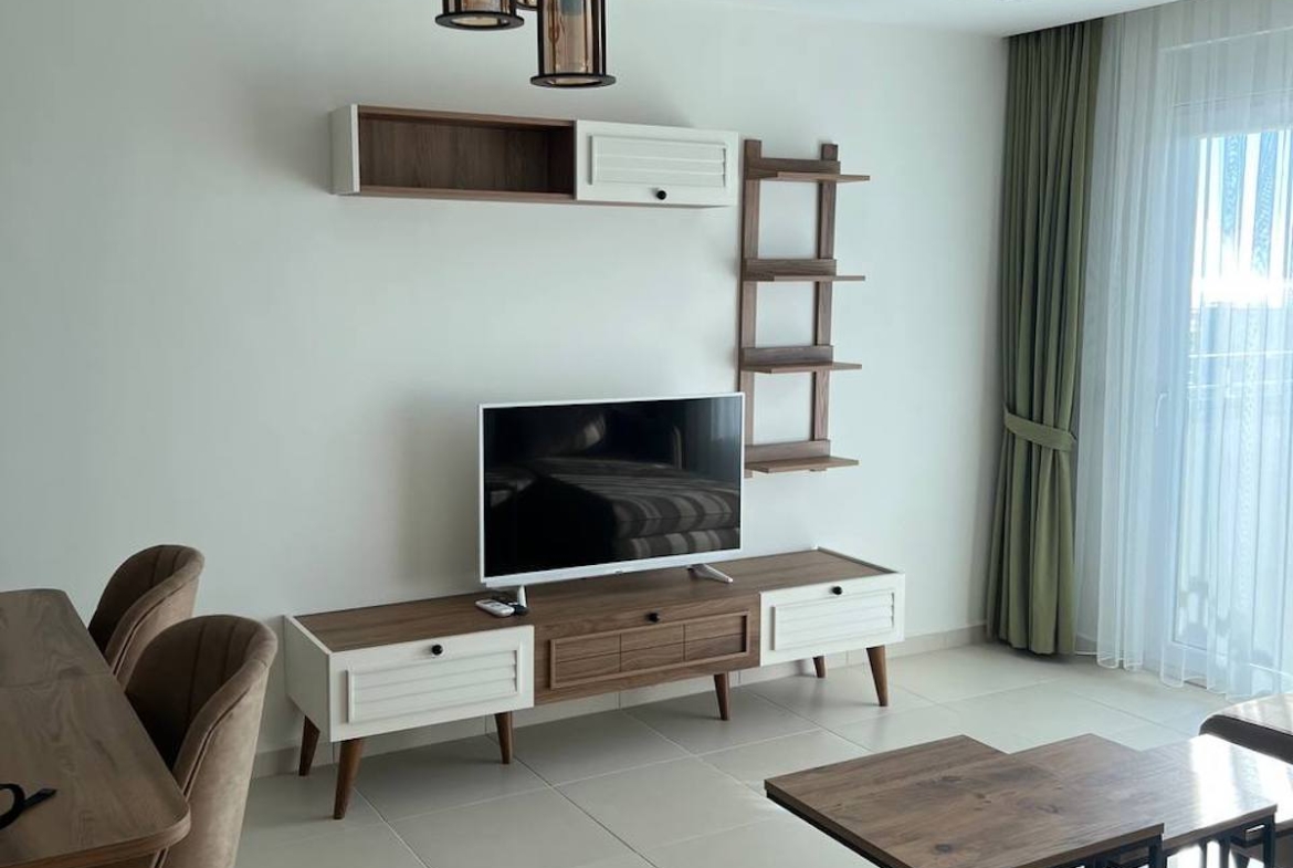 квартира 1+1 с панорамным видом в районе Махмутлар