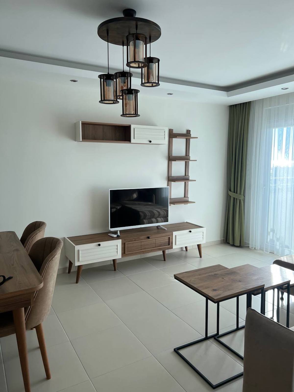 квартира 1+1 с панорамным видом в районе Махмутлар