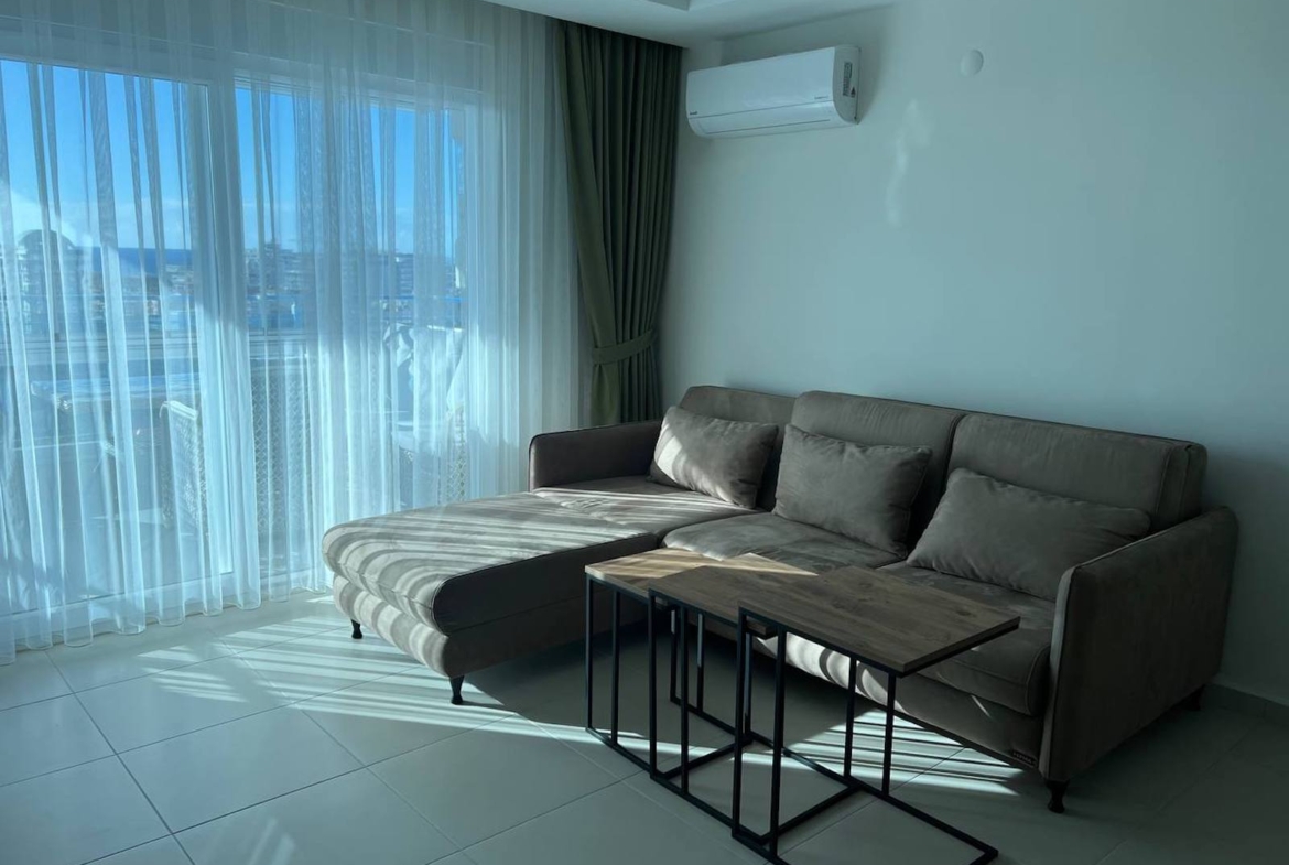 квартира 1+1 с панорамным видом в районе Махмутлар