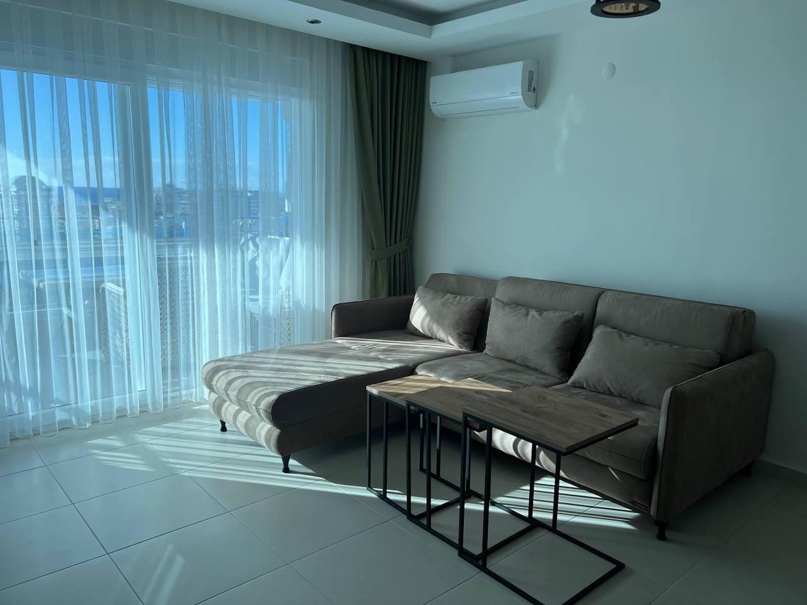 квартира 1+1 с панорамным видом в районе Махмутлар