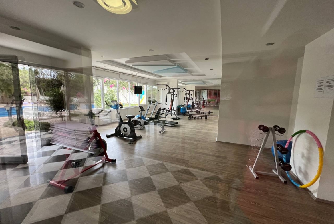 квартира 1+1 с панорамным видом в районе Махмутлар