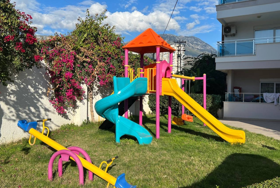 квартира 1+1 с панорамным видом в районе Махмутлар