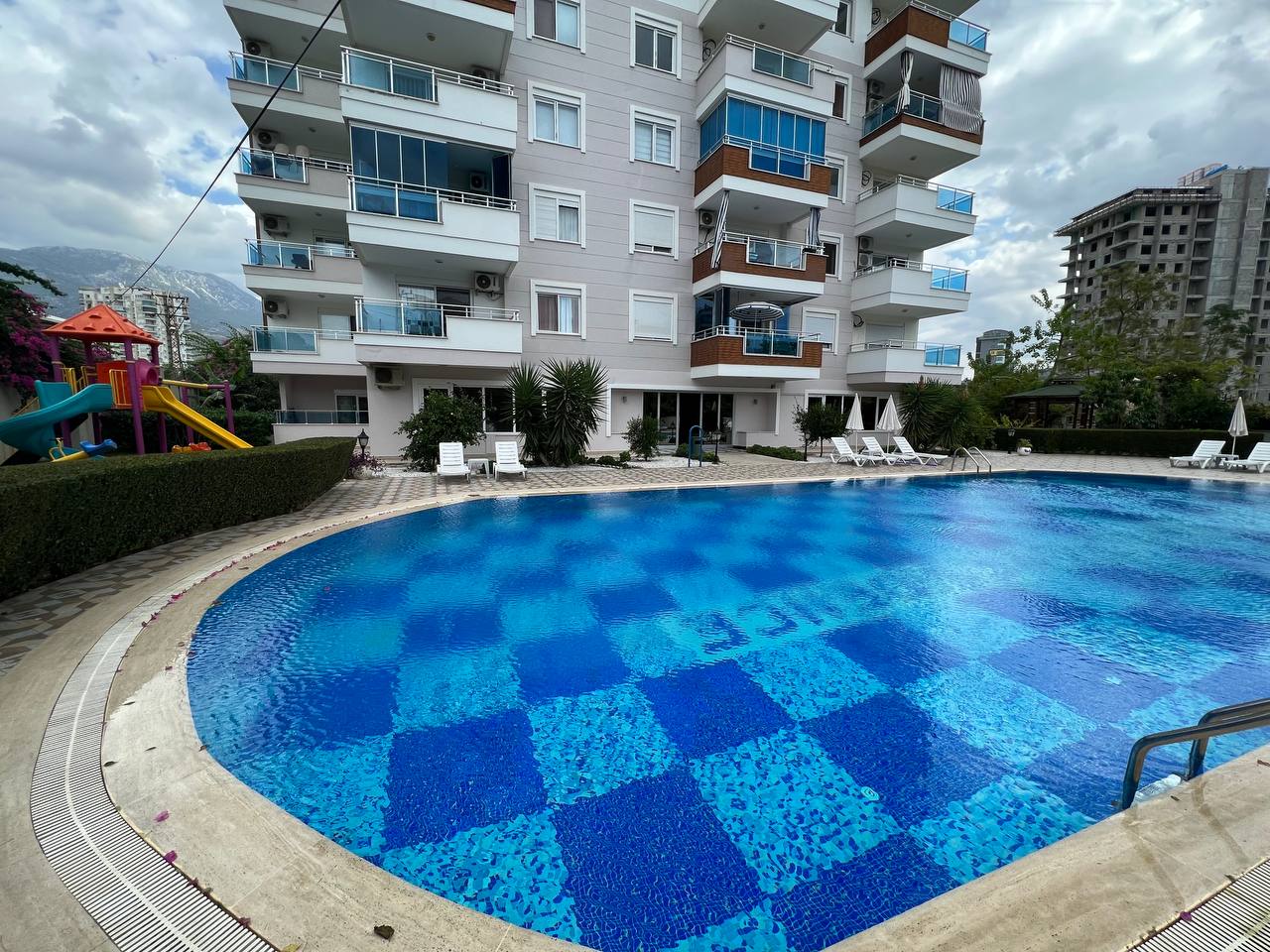 квартира 1+1 с панорамным видом в районе Махмутлар