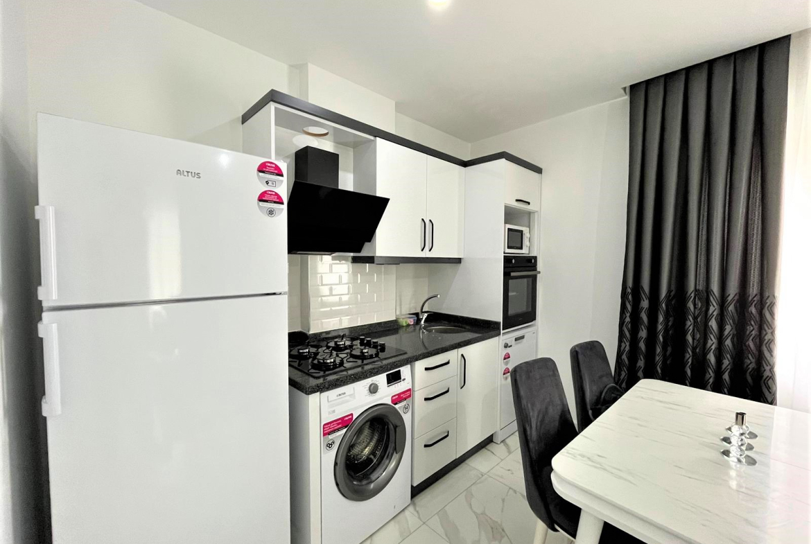 квартира 1+1 в районе Махмутлар в сданном ЖК Best Life 8