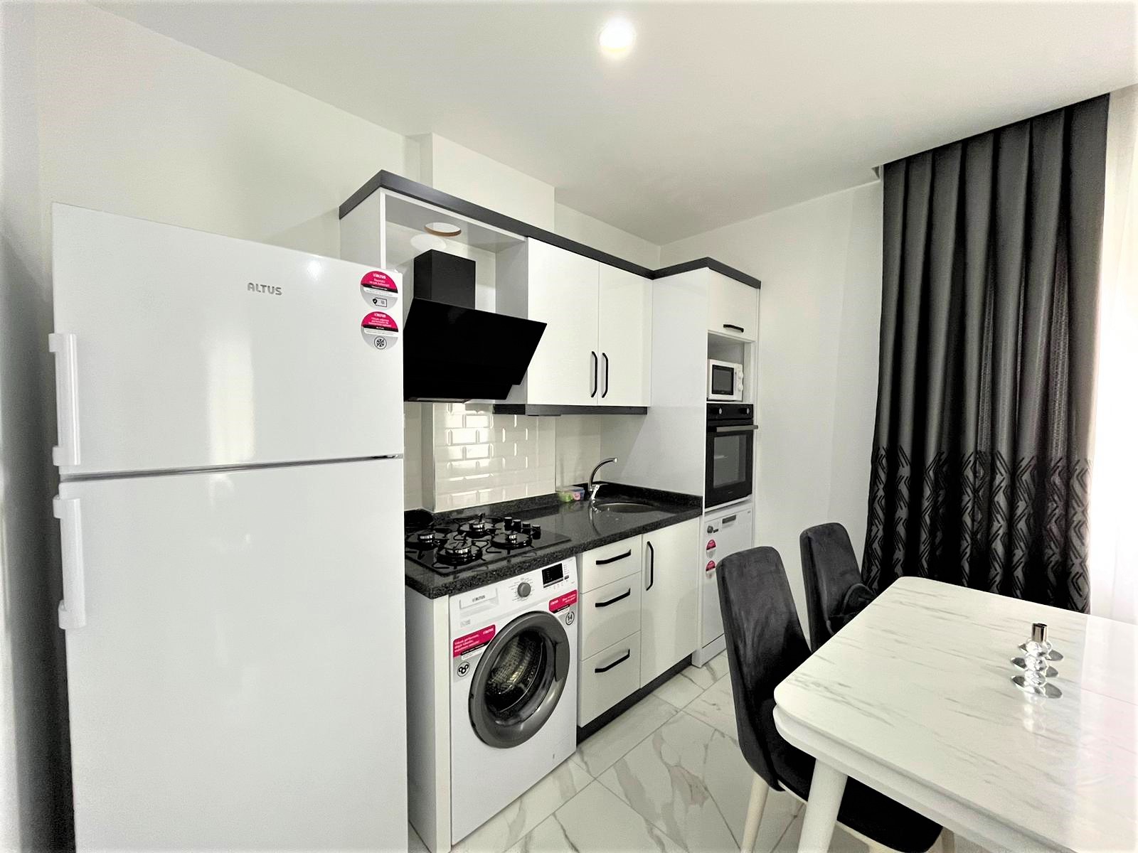 квартира 1+1 в районе Махмутлар в сданном ЖК Best Life 8