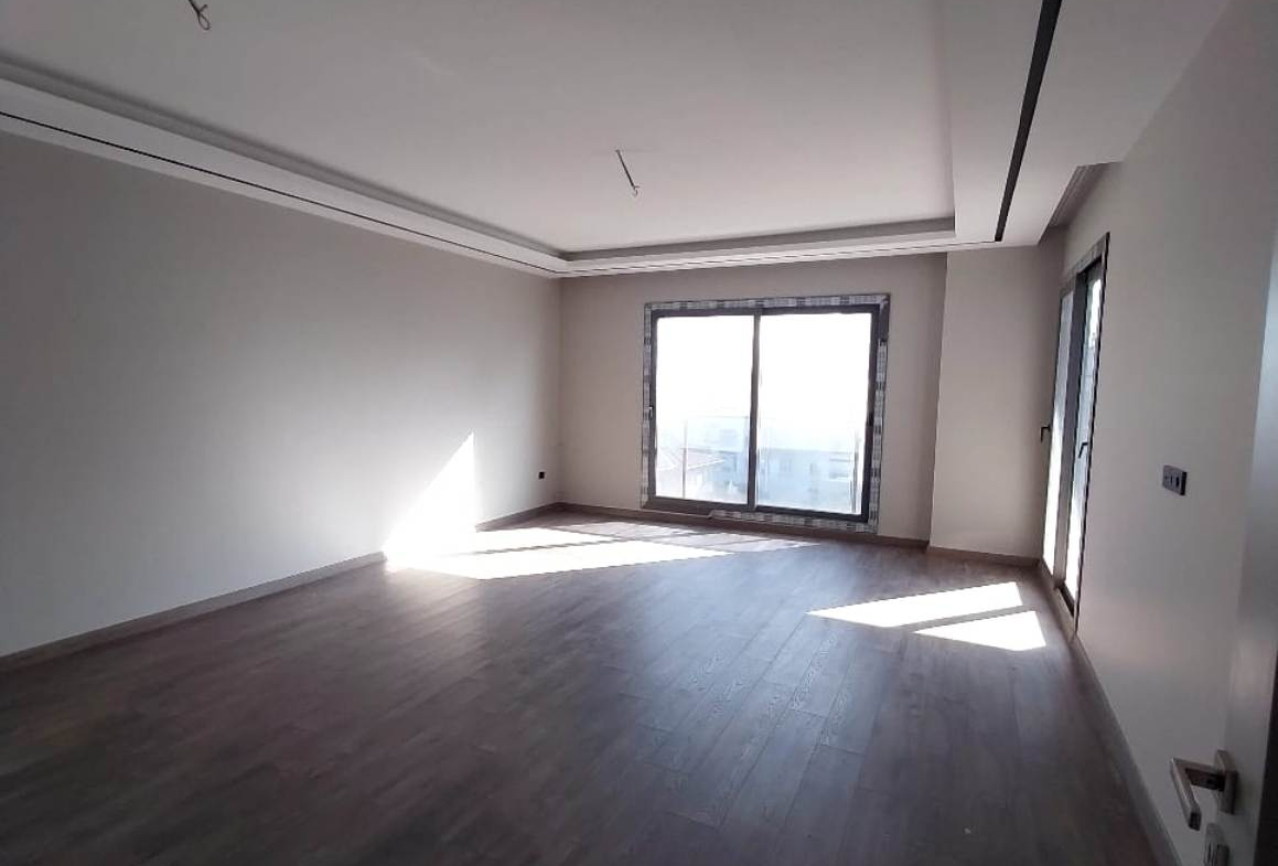 Квартира 5+1 от застройщика в сданном доме в Мерсине