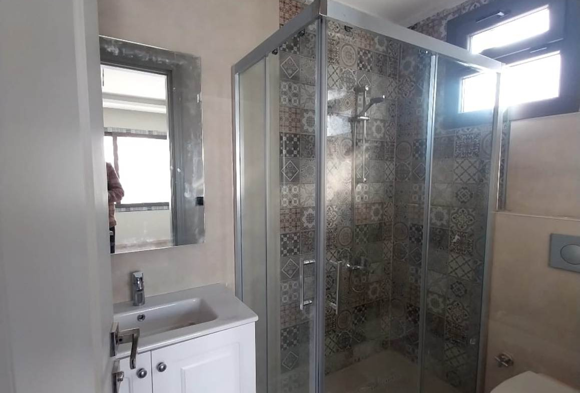 Квартира 5+1 от застройщика в сданном доме в Мерсине