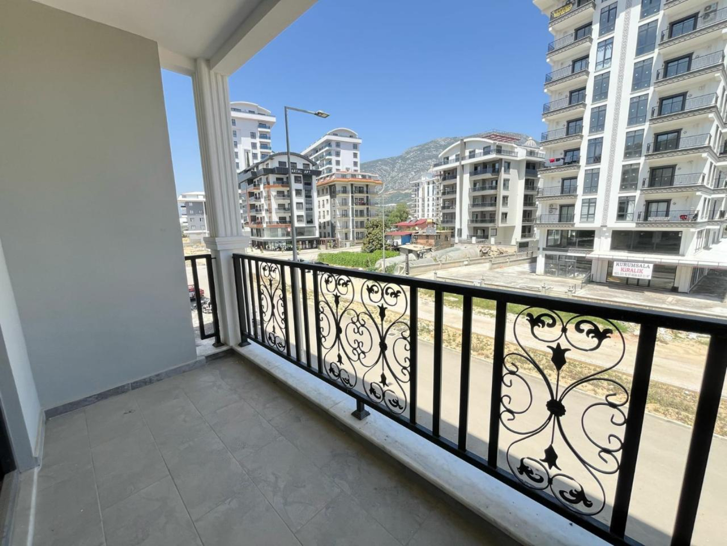 квартира 1+1 с отделкой в районе Махмутлар