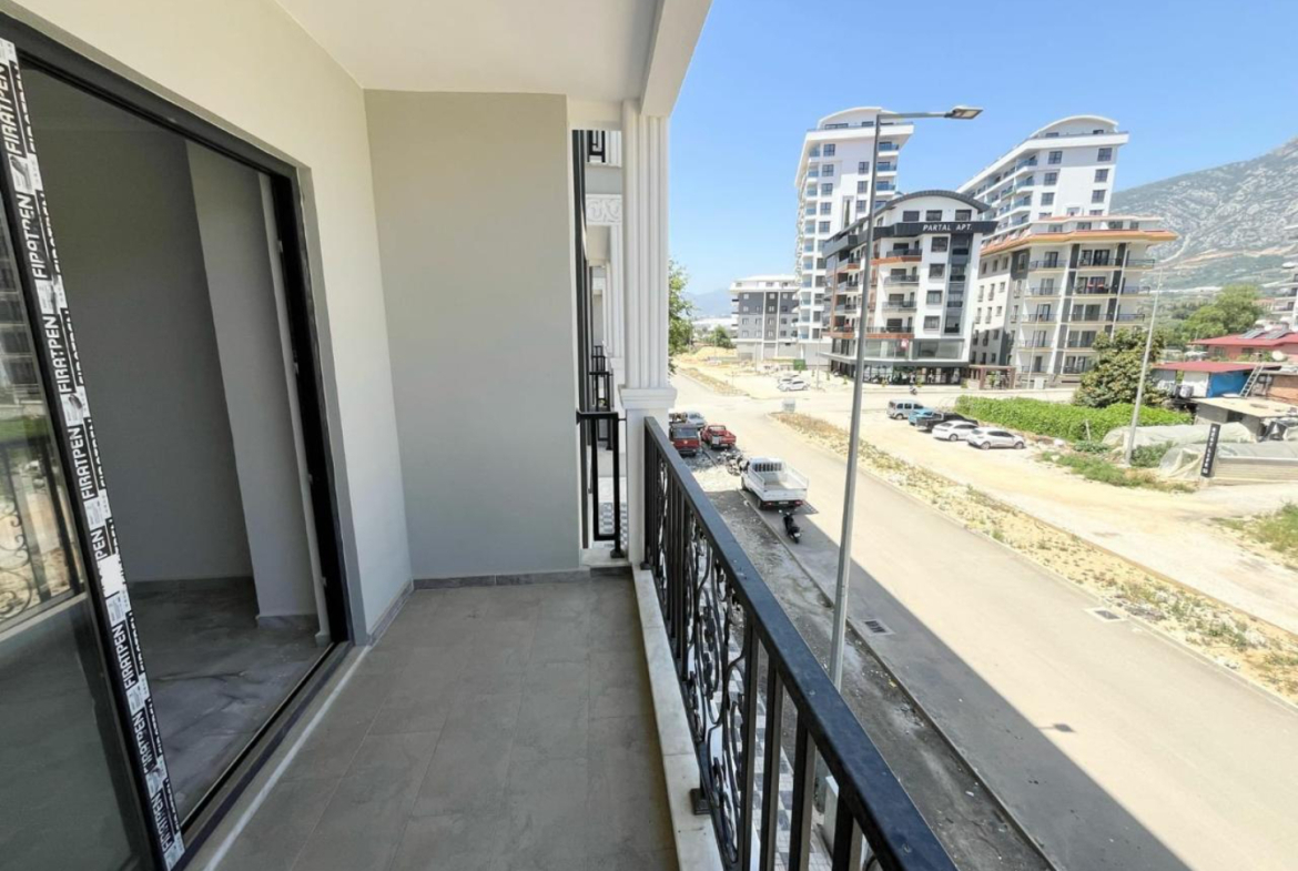 квартира 1+1 с отделкой в районе Махмутлар