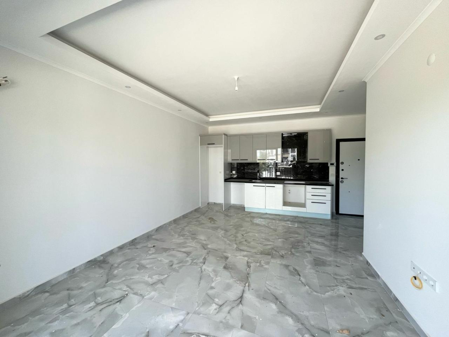 квартира 1+1 с отделкой в районе Махмутлар