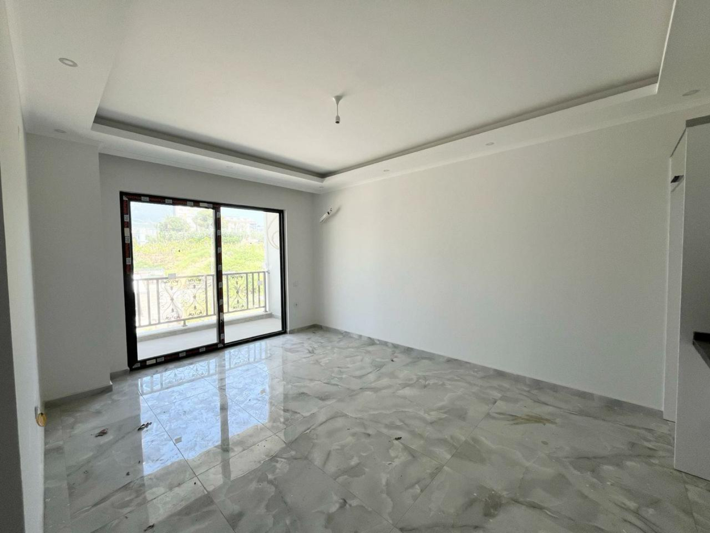 квартира 1+1 с отделкой в районе Махмутлар