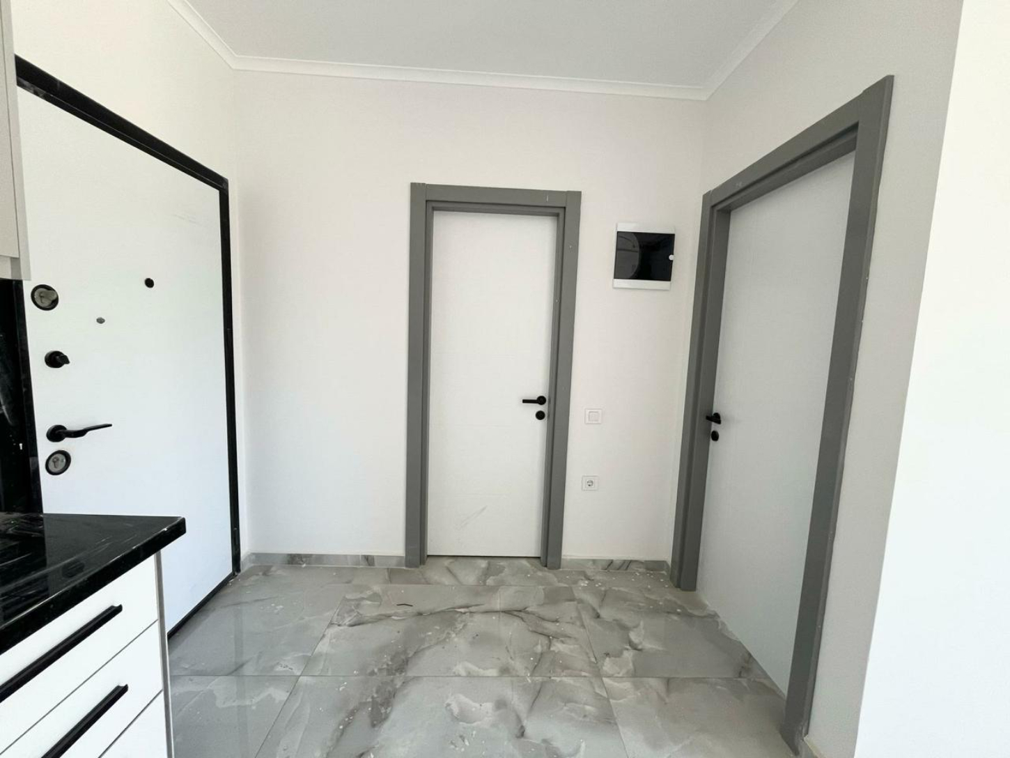 квартира 1+1 с отделкой в районе Махмутлар