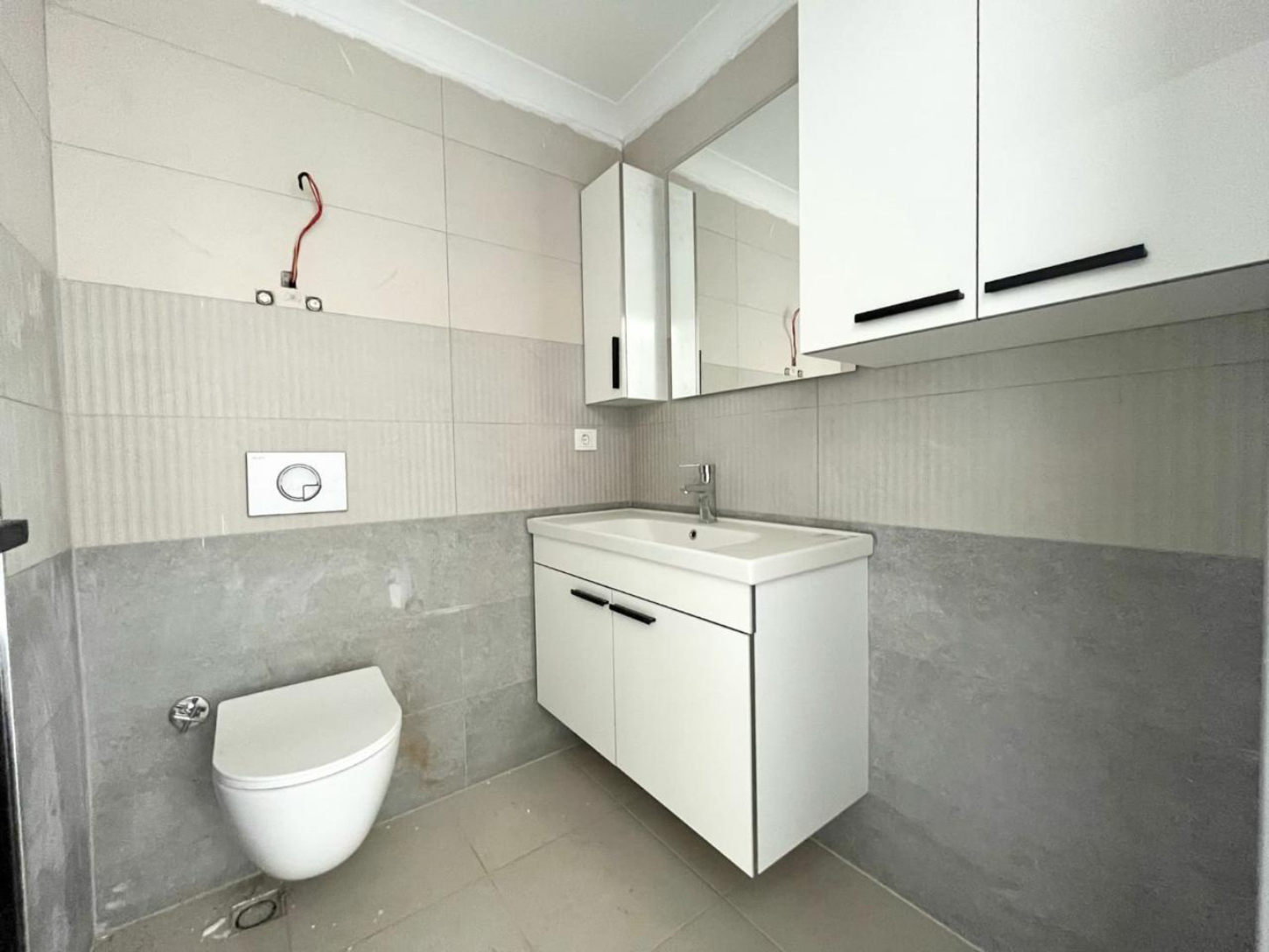 квартира 1+1 с отделкой в районе Махмутлар