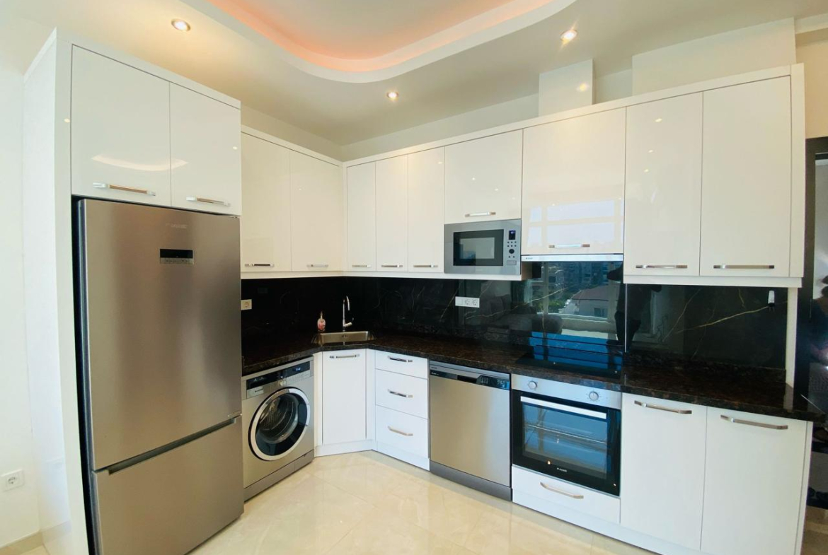 купить квартиру 1+1 в Махмутларе, Аланья