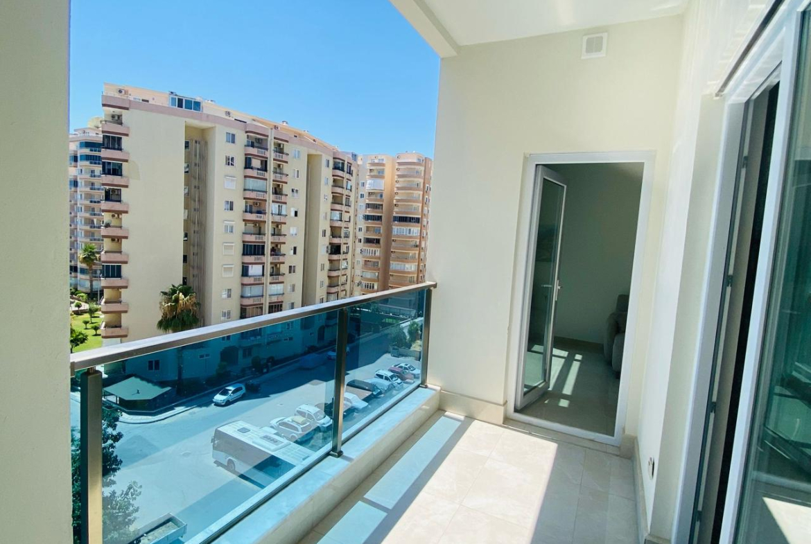 купить квартиру 1+1 в Махмутларе, Аланья