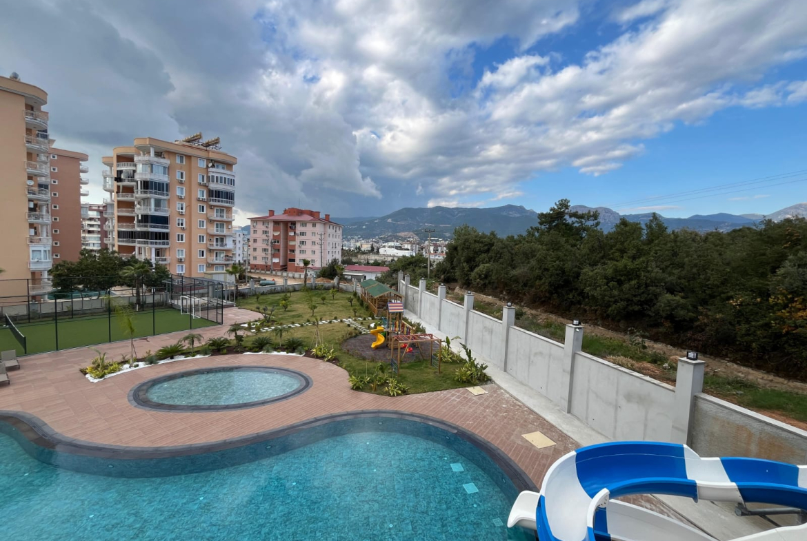 купить квартиру 1+1 в Алании, Тосмур