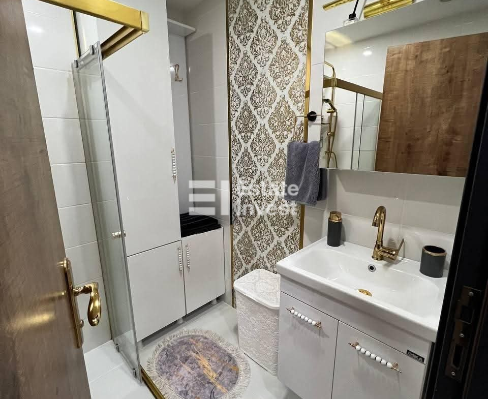 продажа квартиры 1+1 с ремонтом в Махмутларе