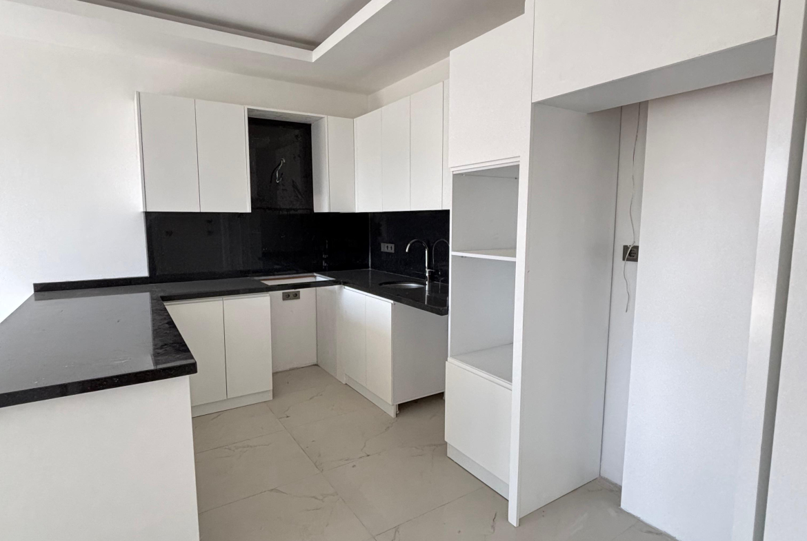 продажа квартиры 1+1 возле моря, Аланья