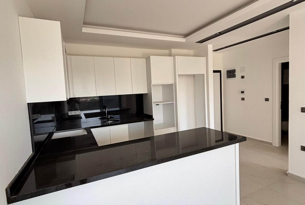 продажа квартиры 1+1 возле моря, Аланья