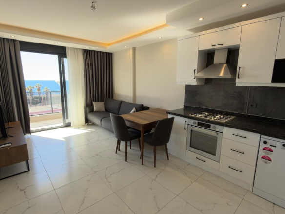 продажа квартиры 1+1 на первой линии моря, Алания