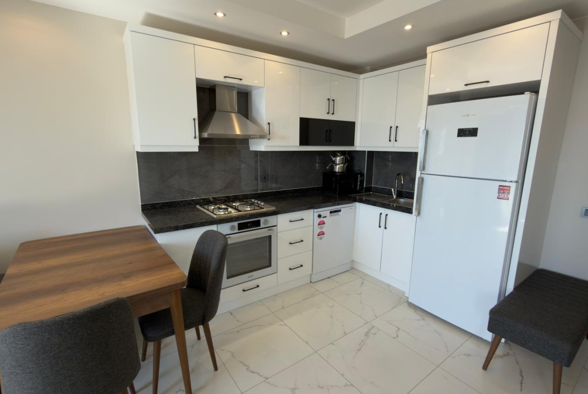 продажа квартиры 1+1 на первой линии моря, Алания