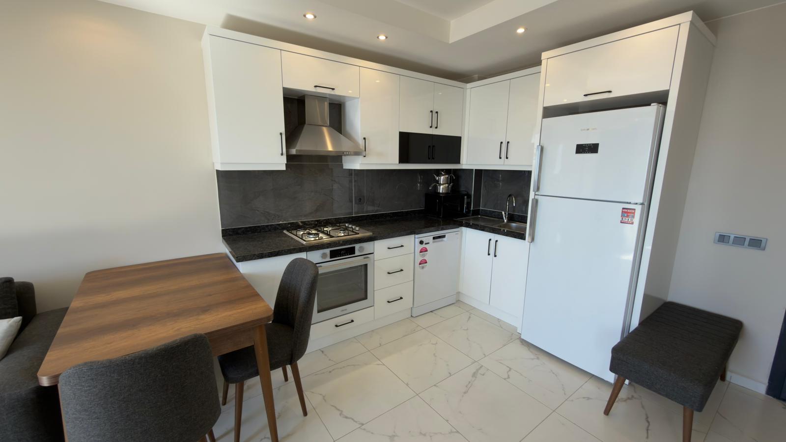 продажа квартиры 1+1 на первой линии моря, Алания