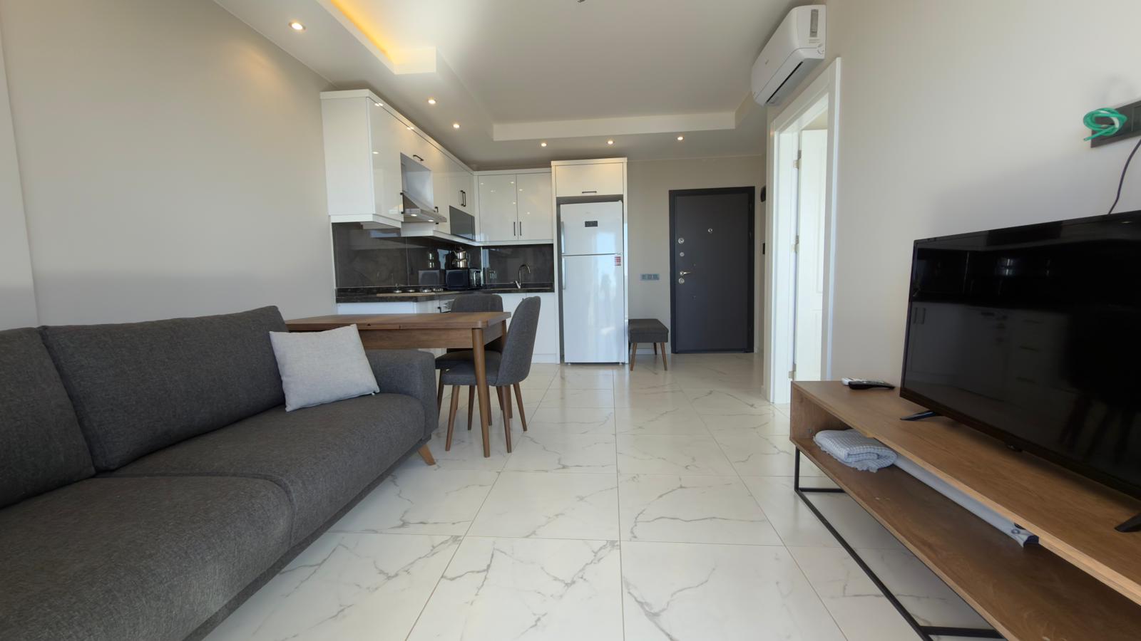 продажа квартиры 1+1 на первой линии моря, Алания