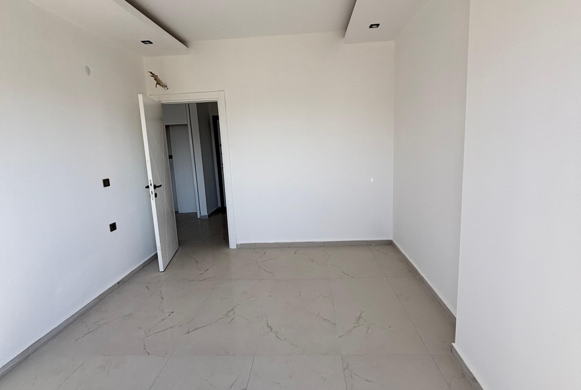 продажа квартиры 1+1 возле моря, Аланья