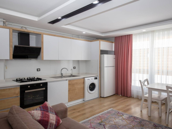 квартира 1+1 в комплексе у моря, Анталья