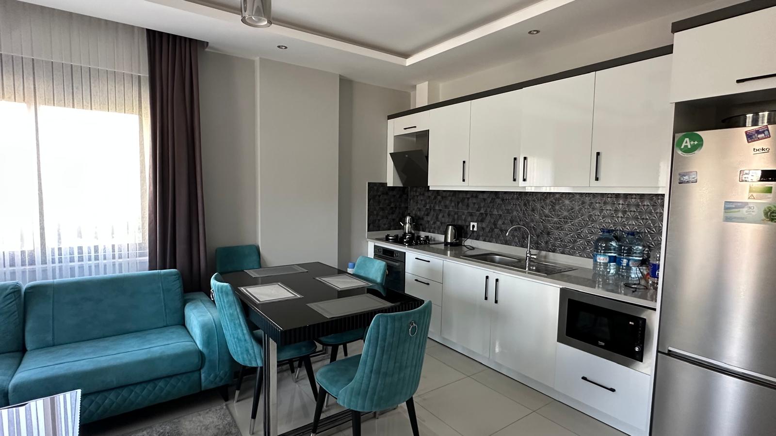 меблированная квартира в комплексе у моря, Алания