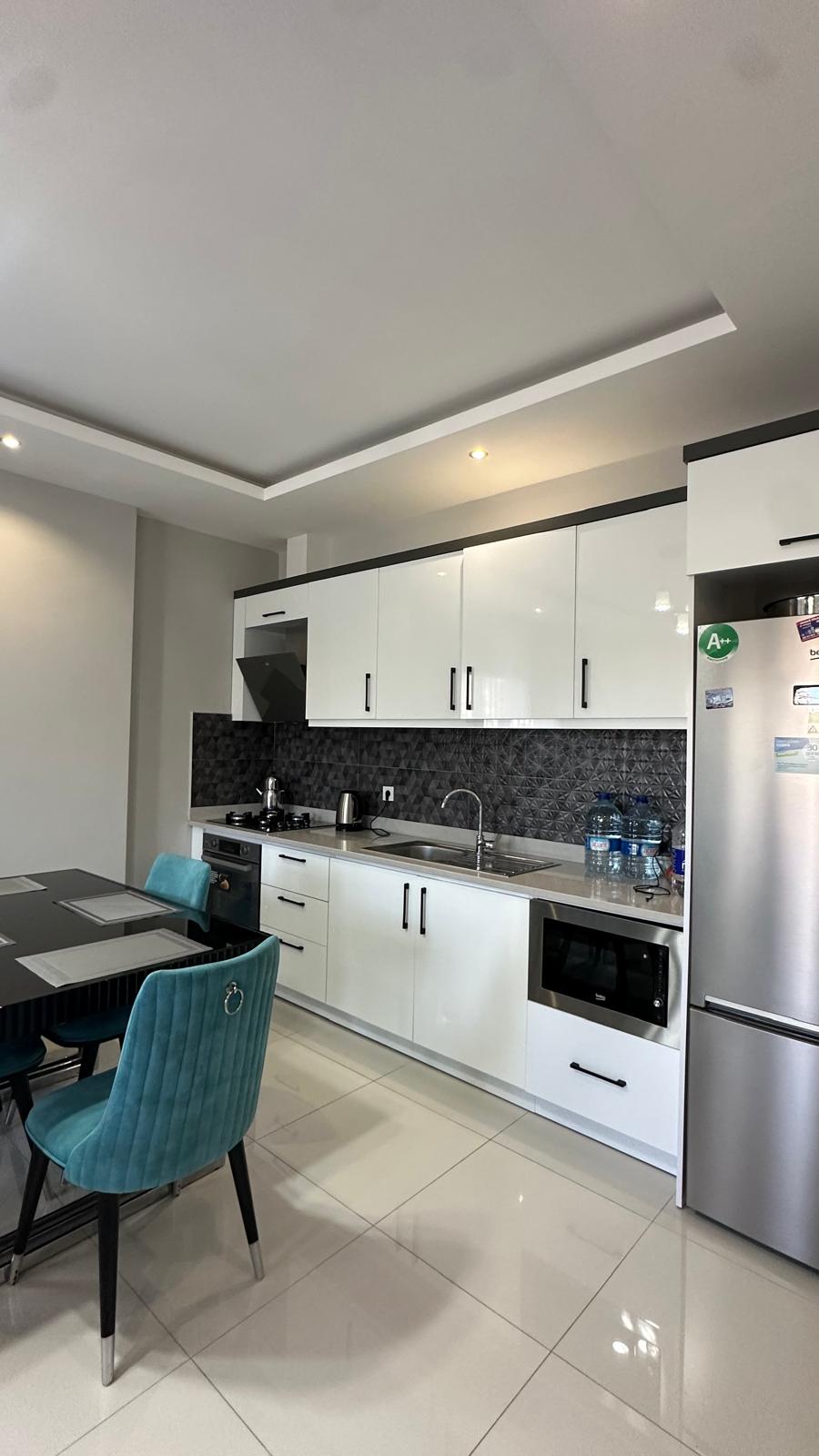 меблированная квартира в комплексе у моря, Алания