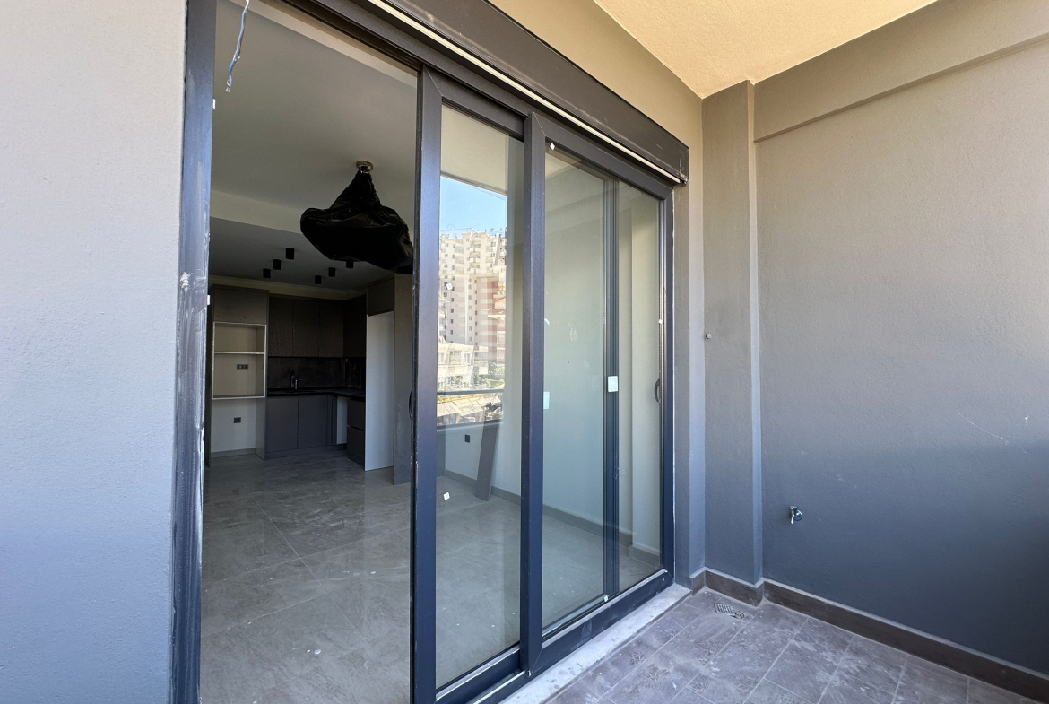 продажа квартиры в новом комплексе в районе Джикджилли, Алания