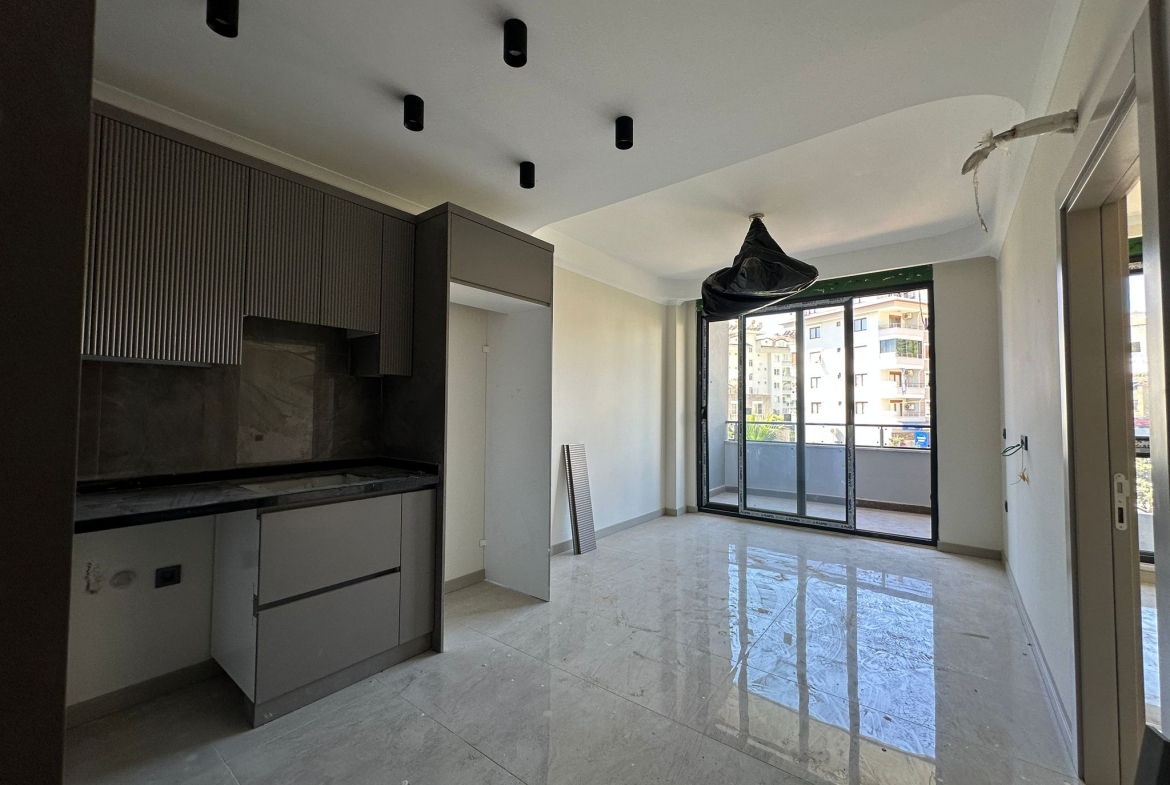 продажа квартиры в новом комплексе в районе Джикджилли, Алания