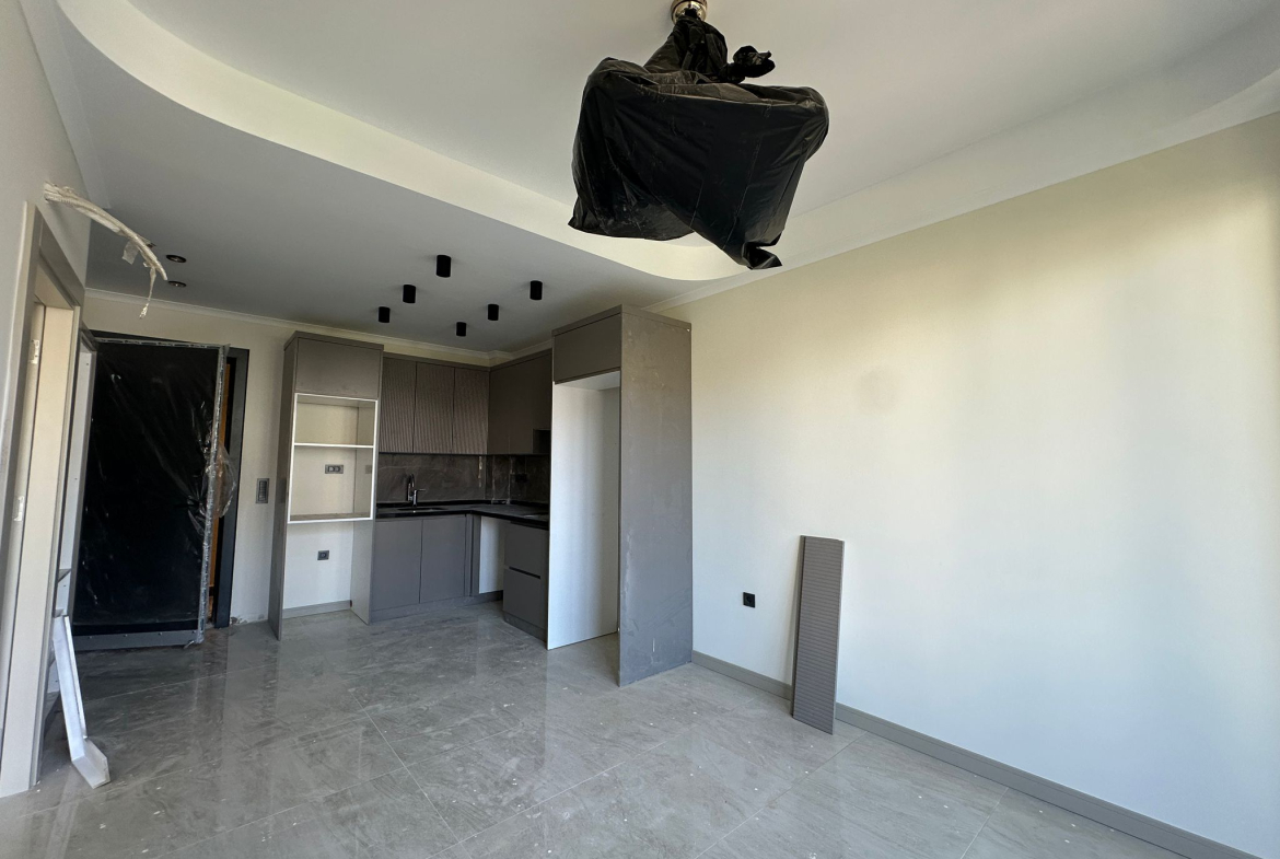 продажа квартиры в новом комплексе в районе Джикджилли, Алания