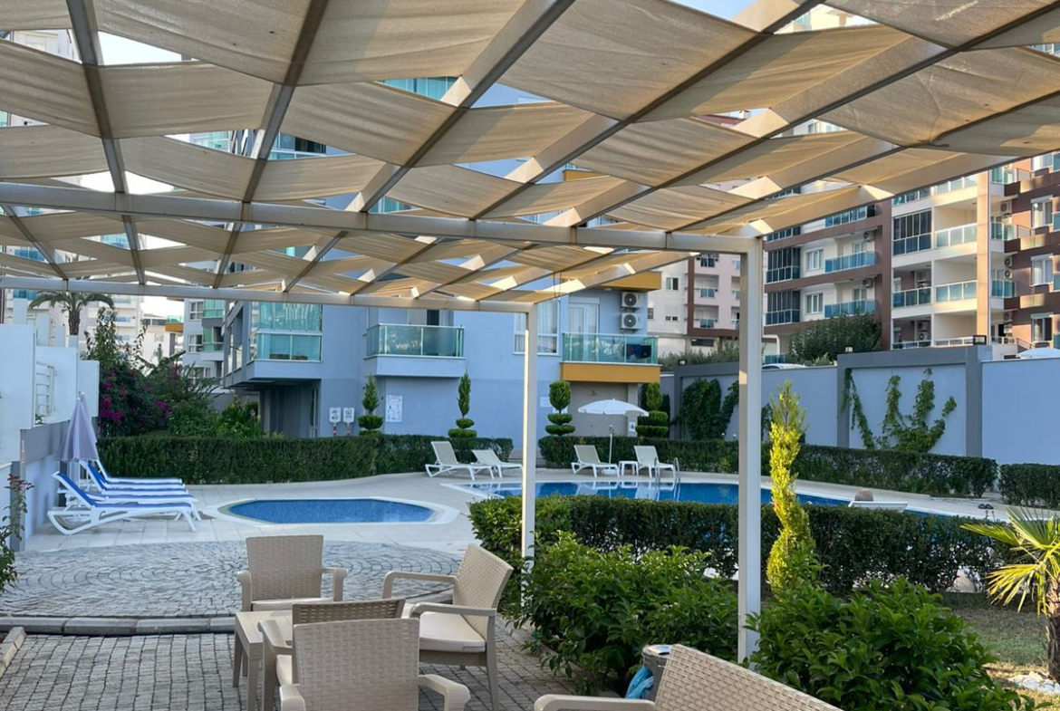 меблированная квартира 1+1 в Махмутларе