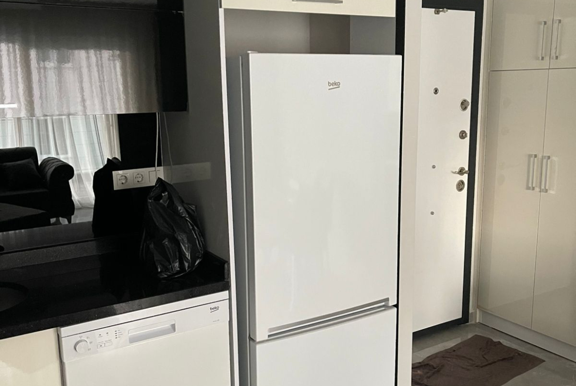 меблированная квартира 1+1 в Махмутларе