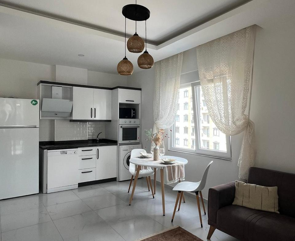 продажа квартиры 1+1 с мебелью в Махмутларе