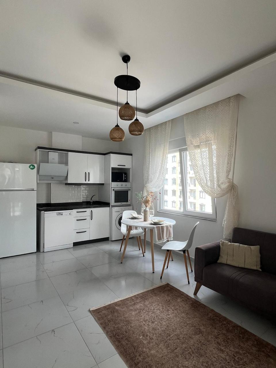 продажа квартиры 1+1 с мебелью в Махмутларе