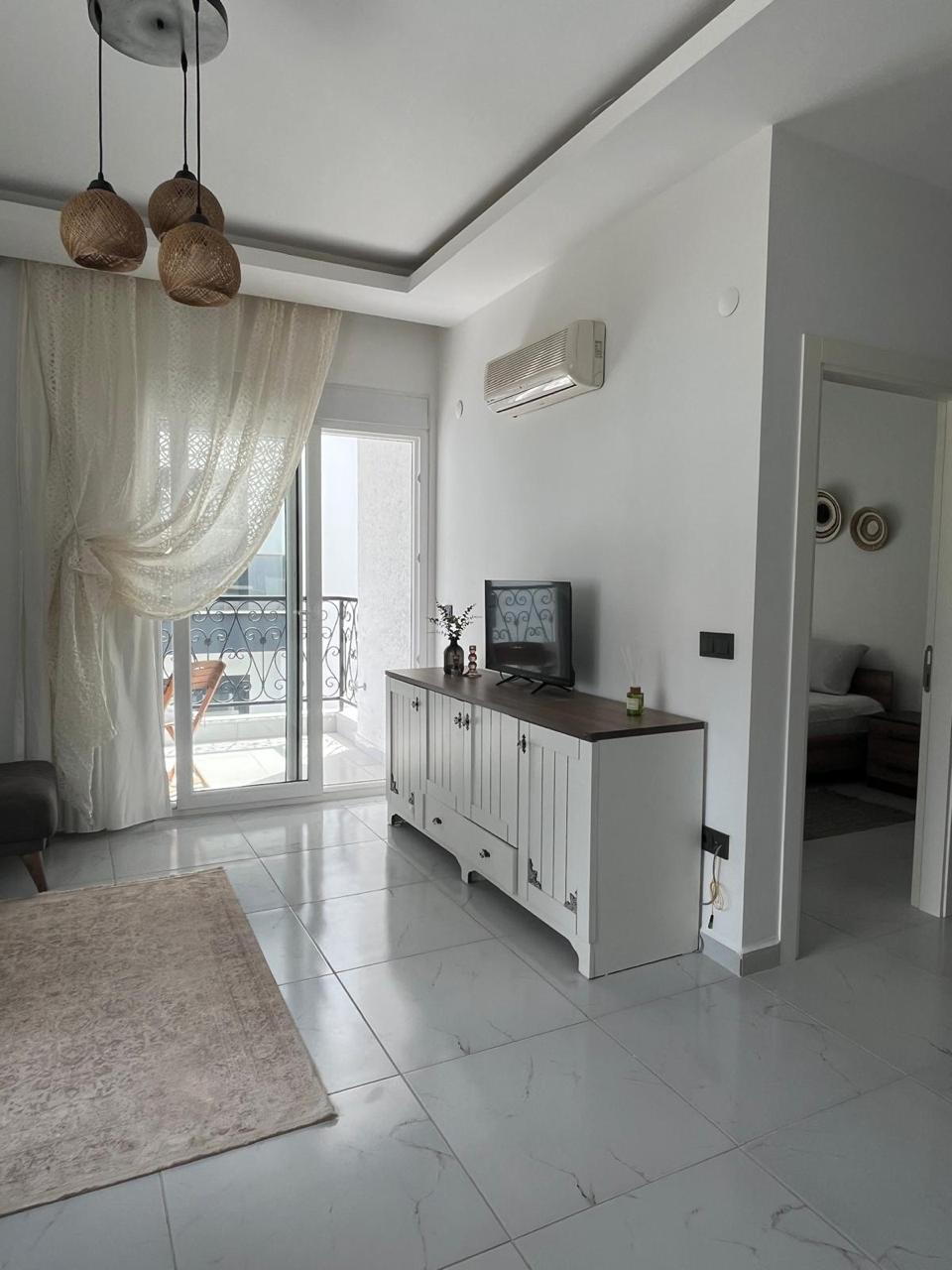 продажа квартиры 1+1 с мебелью в Махмутларе