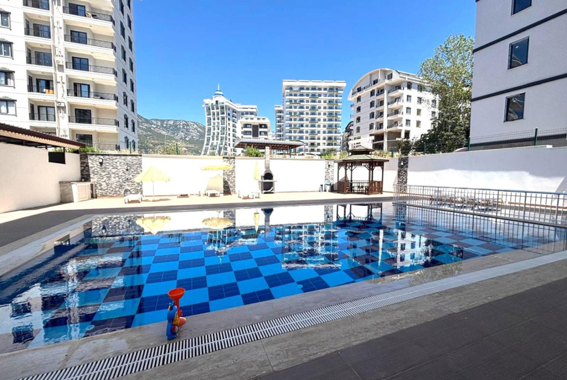 продажа квартиры 1+1 с мебелью в Махмутларе