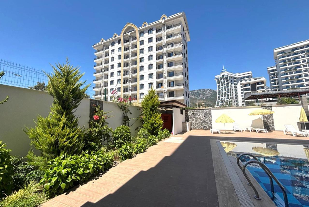 продажа квартиры 1+1 с мебелью в Махмутларе