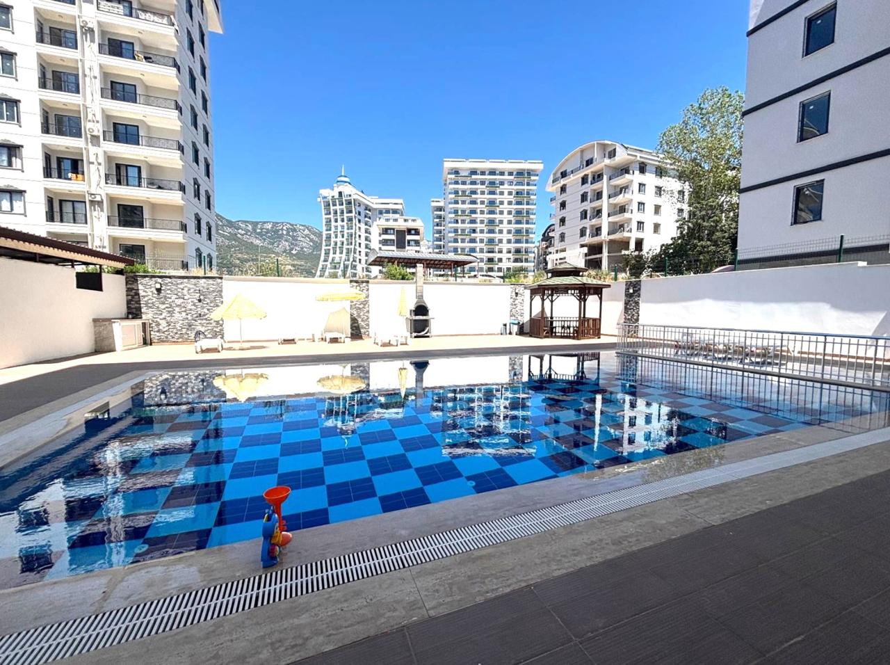 продажа квартиры 1+1 с мебелью в Махмутларе