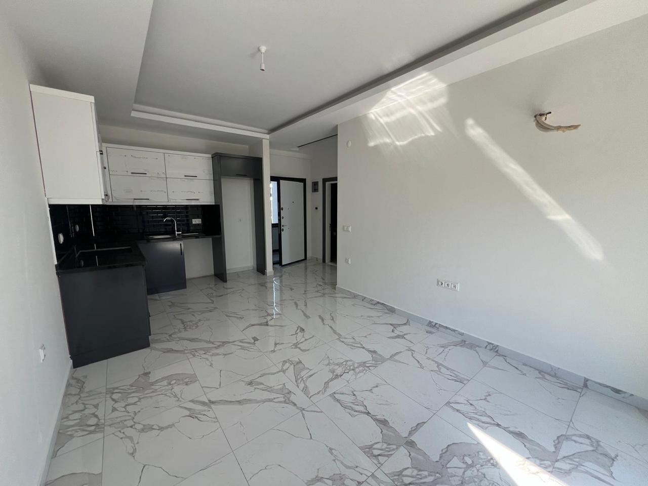 продажа квартиры 1+1 возле моря, Аланья