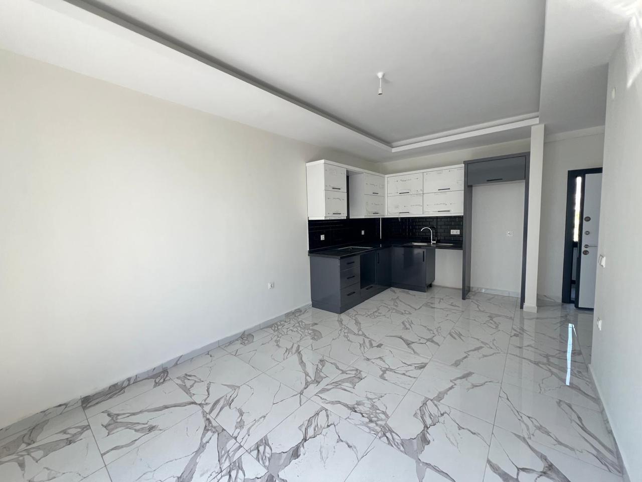 продажа квартиры 1+1 возле моря, Аланья