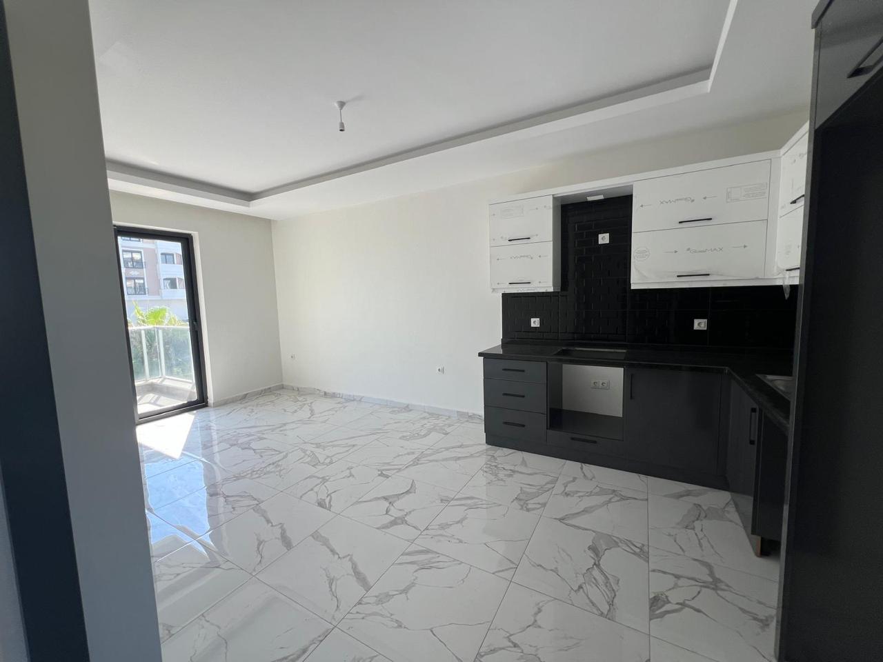 продажа квартиры 1+1 возле моря, Аланья