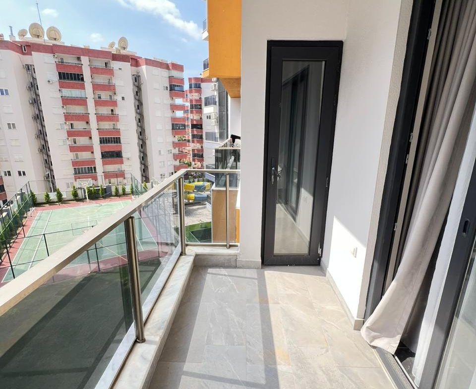 продажа квартиры с мебелью в Tekinoglu Mahmutlar