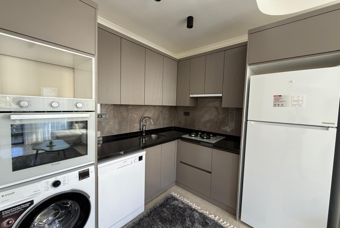 продажа квартиры в новом комплексе в районе Джикджилли, Алания